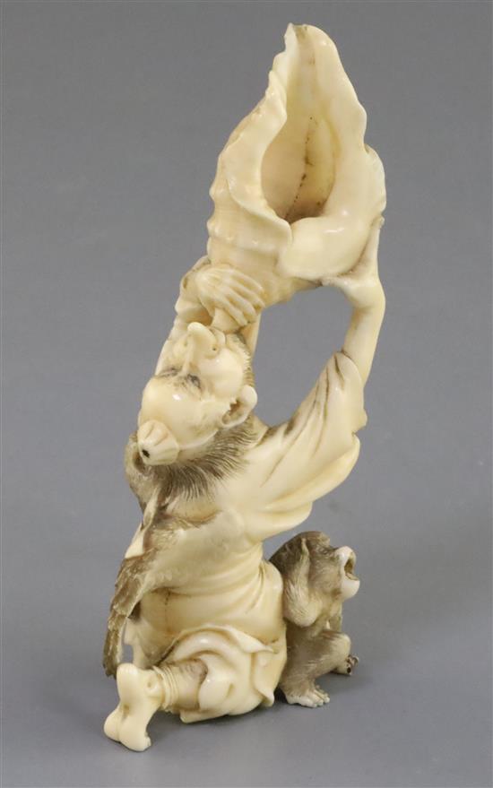 A Japanese ivory okimono of a Yamabushi Tengu, Meiji period, H. 11.8cm